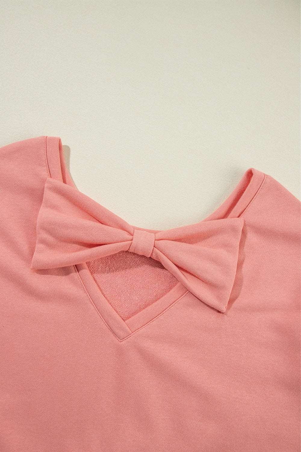 Cutout Bow Round Neck Long Sleeve Sweatshirt