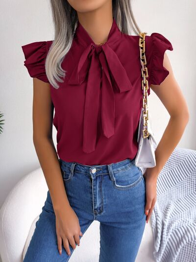 Blouse à manches courtes et col noué