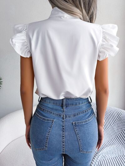 Blusa con mangas japonesas y cuello anudado